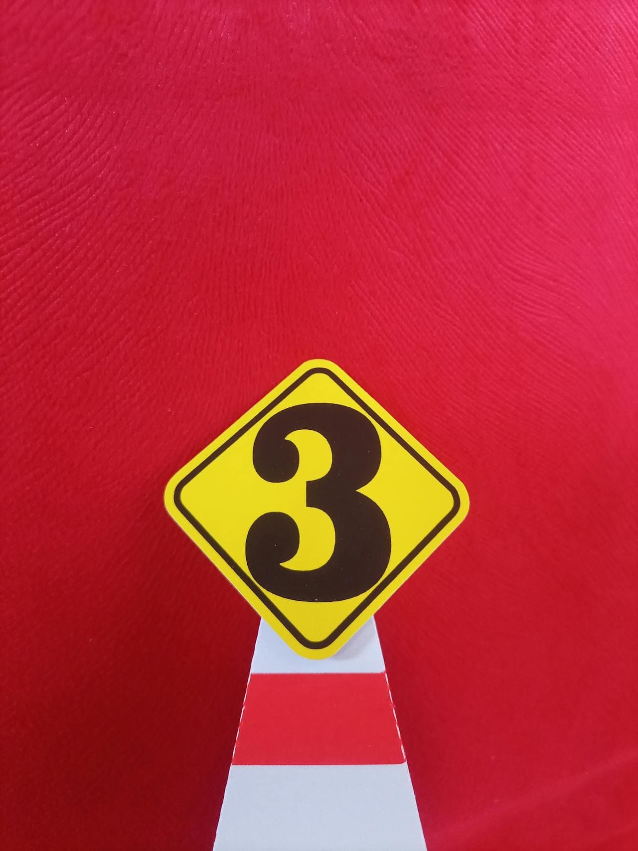Three decorative cake toppers